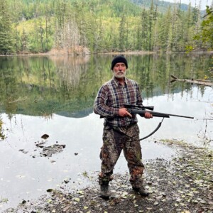 Region 1 President Doug Bancroft holding a firearm in his region of Victoria